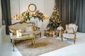 Retro sofa. Chair. Christmas tree and fireplace