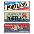 Vintage tin sign set Portland. Retro souvenirs or old postcard templates on rust background.