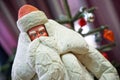 Retro Soviet New Year toy - Santa Claus made of cotton wool in the lobby of the city administration building. Vintage. Christmas