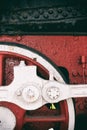 Retro steam locomotive wheels and rods. Details of mechanical parts, wheels and equipment of the train. Royalty Free Stock Photo