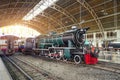 Retro steam train arrived from the arch railway station.