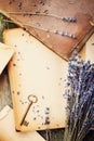 Retro still life with vintage books, key and lavender flowers, nostalgic composition on wooden table from above. Royalty Free Stock Photo