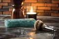 retro straight razor and shaving brush on countertop