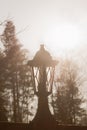 Retro street lamp at sunset. Vintage lantern at evening light Royalty Free Stock Photo