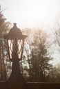 Retro street lamp at sunset. Vintage lantern at evening light Royalty Free Stock Photo