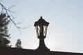 Retro street lamp at sunset. Vintage lantern at evening light Royalty Free Stock Photo