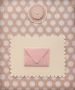 Retro style album page with mail envelope and flower decoration on vintage polka dot pattern textile