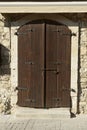 Wooden exterior door in stone wall