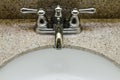 Retro style Chrome Faucet and old sink in bathroom Royalty Free Stock Photo