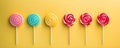 Retro style colorful round shape lollipop on bright background. Round spiral candy on stick Royalty Free Stock Photo