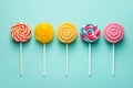 Retro style colorful round shape lollipop on bright background. Round spiral candy on stick Royalty Free Stock Photo