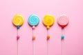 Retro style colorful round shape lollipop on bright background. Round spiral candy on stick Royalty Free Stock Photo