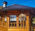 Retro style cottage countryside village hut cabin with front frame window and wooden facade in the nature