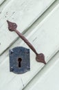 Retro style keyhole and old rusty door handle Royalty Free Stock Photo