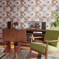 Retro style living room with hi-fi audio turntable. Colorful patterns and furniture. 3D render.