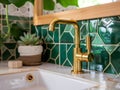 Retro style metal tap and sink in modern bathroom interior with soap bottle and green ceramic tiles wall in the Royalty Free Stock Photo