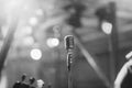 Retro style microphone on a pole in a concert