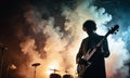 Retro style photo of bassist silhouette surrounded by smoke in concert