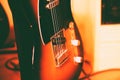 Retro style picture of a guitar, close-up, warm colors Royalty Free Stock Photo