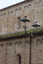 Retro-style street lampposts along a pedestrian street in the city of Acqui Terme, Italy.