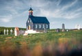 Retro style view of Hvalsneskirkja church. Picturesque summer scene of Iceland, KeflavÃÂ­k location. Royalty Free Stock Photo