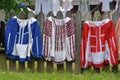 Original Romanian traditional handmade women`s blouses exposed in village museum Bucharest. Romanian ia