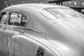 Retro-styled Back Of A Classic Car With Headlights In Black And White Image. The Headlights Are Finished In Shiny Chrome