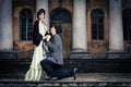 Retro styled fashion portrait of a young couple. Royalty Free Stock Photo