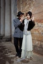 Retro styled fashion portrait of a young couple. Royalty Free Stock Photo