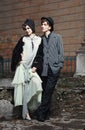 Retro styled fashion portrait of a young couple. Royalty Free Stock Photo