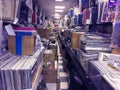 Retro styled image of boxes with vinyl turntable records on a flee market Royalty Free Stock Photo