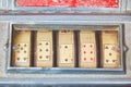 Close up of a weathered vintage slot machine with playing cards Royalty Free Stock Photo