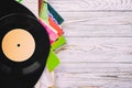 Retro styled image of a collection of old vinyl record lp`s with sleeves on a wooden background with Copy space top view toned Royalty Free Stock Photo