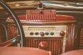 Retro styled image of an old car radio Royalty Free Stock Photo