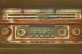 Retro styled image of an old dashboard with seventies car radio Royalty Free Stock Photo