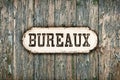 Retro styled image of an old French office sign Royalty Free Stock Photo