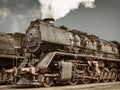 Retro styled image of an old steam locomotive Royalty Free Stock Photo