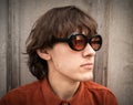 Retro styled man in vintage glasses looking aside Royalty Free Stock Photo