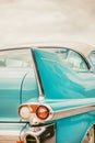 Retro styled rear end of a classic blue Cadillac fifties car in Den Bosch, The Netherlands Royalty Free Stock Photo