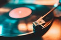 Retro-styled spinning record vinyl player. Close up. Rotating vintage phonograph close up. Beautiful colorful image.