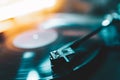 Retro-styled spinning record vinyl player. Close up. Rotating vintage phonograph close up. Beautiful colorful image.