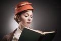 Retro Styled Woman Reading A Book Royalty Free Stock Photo