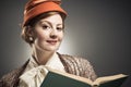 Retro Styled Woman Reading A Book Royalty Free Stock Photo