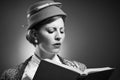 Retro Styled Woman Reading A Book Royalty Free Stock Photo