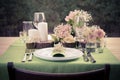 Retro stylized photo of table setting in rustic style.