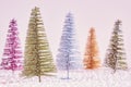 Retro stylized picture of miniature Christmas trees.