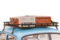 Retro suitcases and radio on the top of the old car Royalty Free Stock Photo