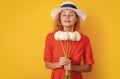 retro summer woman smell flowers in studio. retro summer woman with flowers