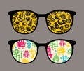 Retro sunglasses with robot pattern reflection.