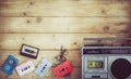 retro technology of radio cassette recorder music with retro tape cassette on wood table Royalty Free Stock Photo